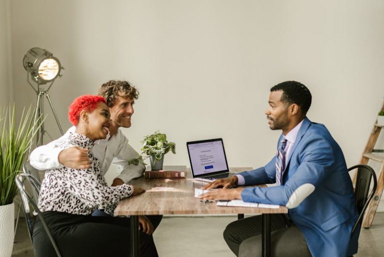 a couple talking to a financial advisor